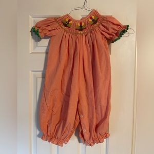 Smocked thanksgiving romper with inseam snaps.